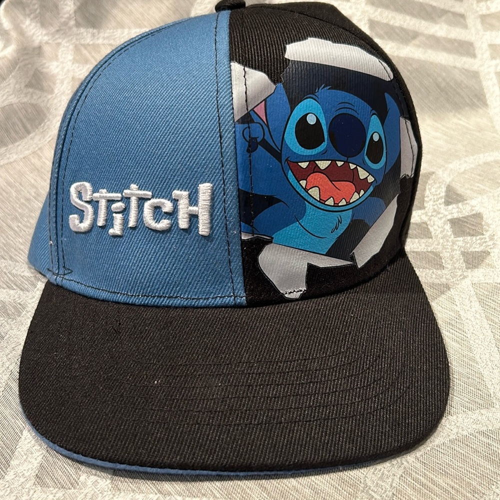 Disney Lilo and Stitch Cap. Logo on the front with adjustable strap-back.